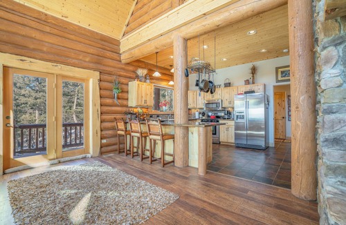 Angel Fire Ski Chalet | Custom high-end 3 bedroom log cabin sleeps 12. Located on the ski hill!