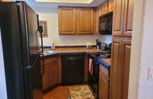Tucson Condo | Hacienda in the desert. Tucson flair enhances the charm of this Greens condo