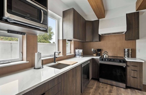 Kerns House | Kerns 6BR Gem - New Build, Spanish Flair