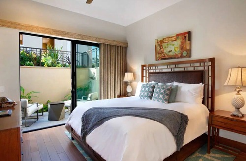 Lihue Hotel | Luxurious Suite with Balcony Ideal for Wellness-Focused Kauai Getaways