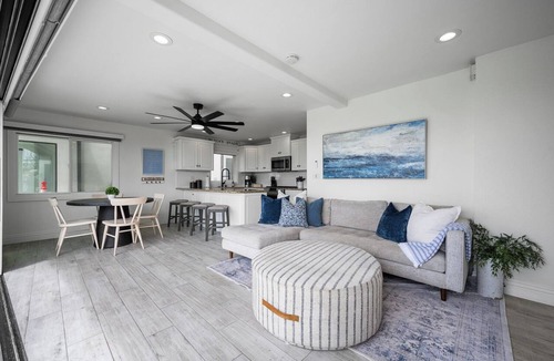 Balboa Peninsula Apartment | Patio on the Boardwalk steps to the Ocean