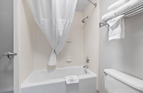 Orchard District Hotel | Relax and Recharge! 3 Comfortable Units! Enjoy Pool Access and Parking On-Site!