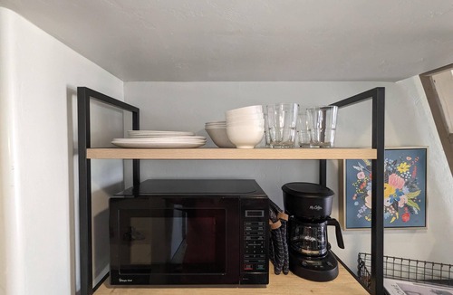 Sam Hughes Apartment | Tiny house with loft bed, kitchenette, parking in a quiet downtown neighborhood