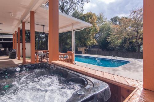 Pool and Hot Tub Oasis with Coastal Vibes Near AU