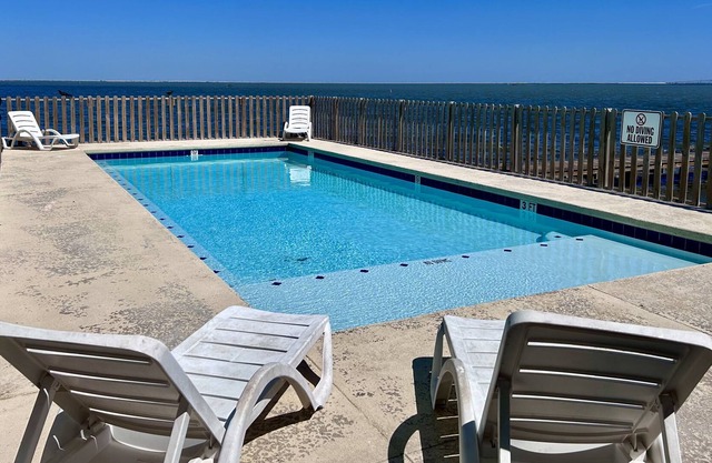New Listing! Near the Water with Private Pier, Boat Slip & Community Pool!