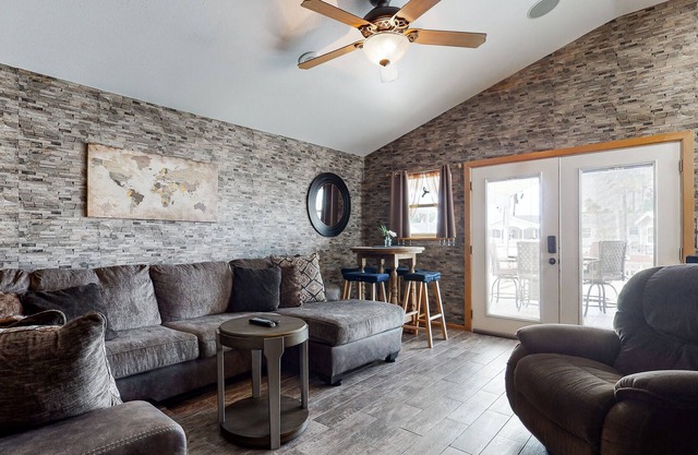 Waterfront home with pool, hot tub, Tesla charge station, dock, boat lift, & gym
